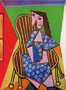 mujer sentada en un sillón. 41.